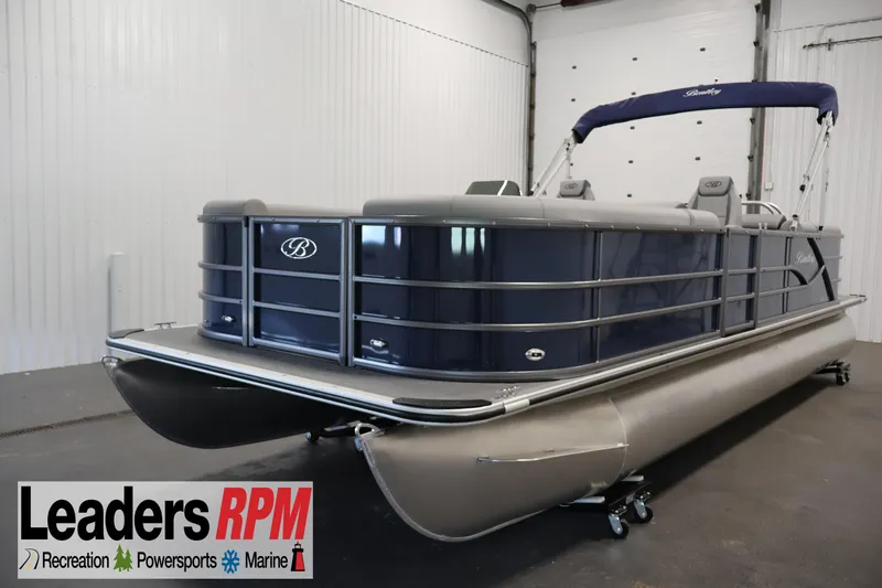 Slide: The Image of 2026 Bentley Pontoons 240 Navigator in showroom, featuring sleek design and modern amenities. - 0