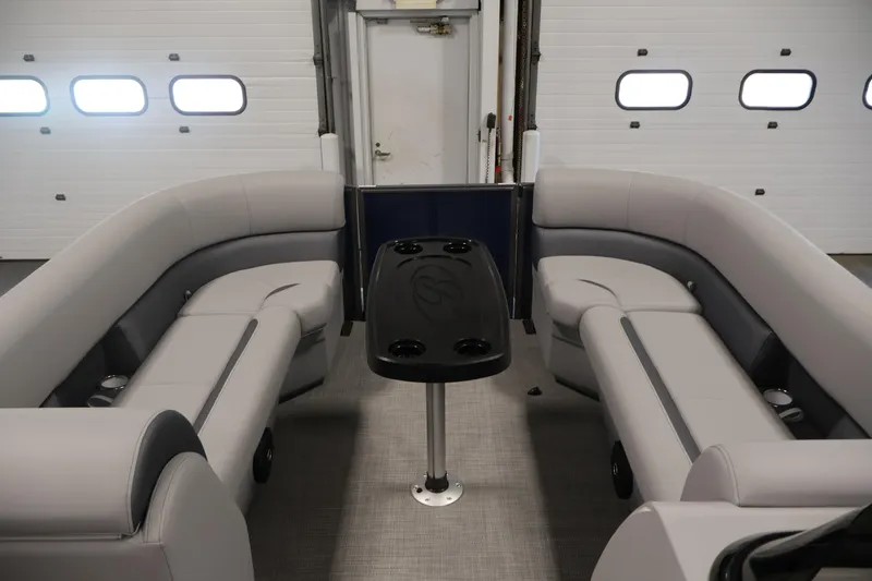 Slide: The Image of Interior of 2026 Bentley Pontoons 240 Navigator with gray seating and central table. - 10