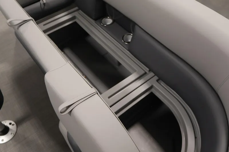 Slide: The Image of Interior seating of 2026 Bentley Pontoons 240 Navigator with cup holders and storage. - 13