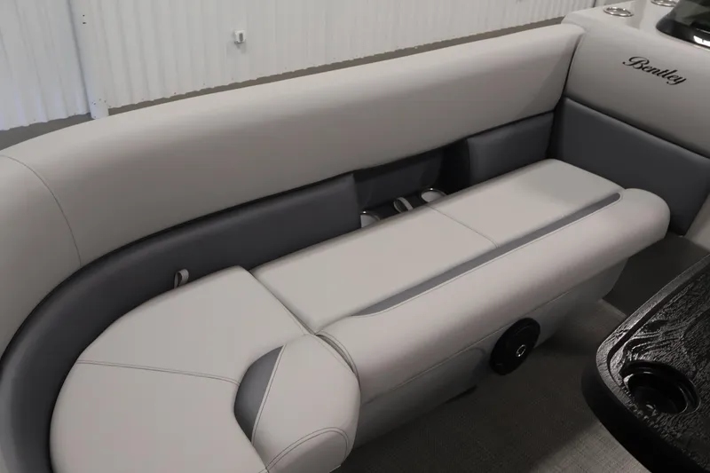 Slide: The Image of Luxurious seating in the 2026 Bentley Pontoons 240 Navigator, featuring elegant gray upholstery. - 14