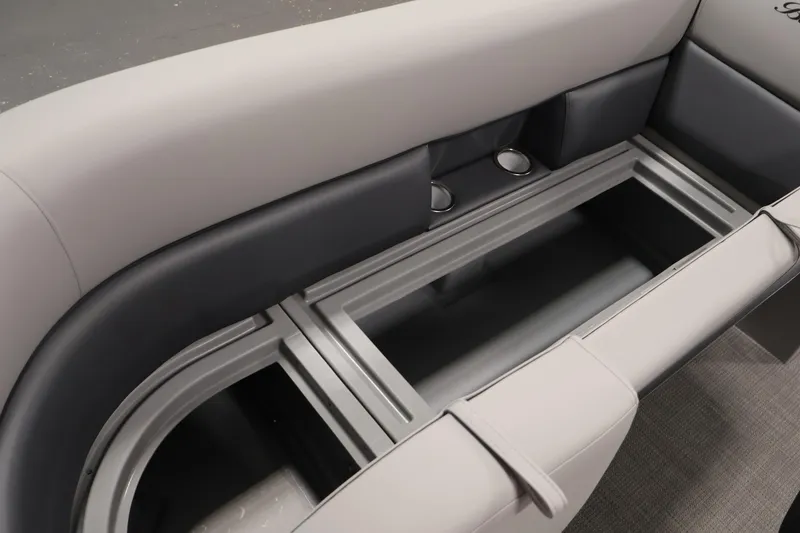 Slide: The Image of 2026 Bentley Pontoons 240 Navigator seating with integrated storage and cup holders. - 15