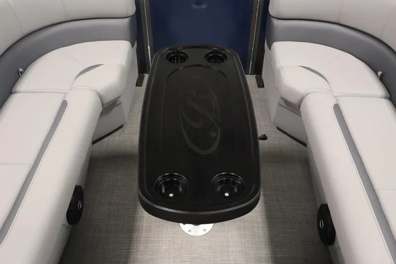 Slide: The Image of Interior of 2026 Bentley Pontoons 240 Navigator with sleek seating and central table. - 16