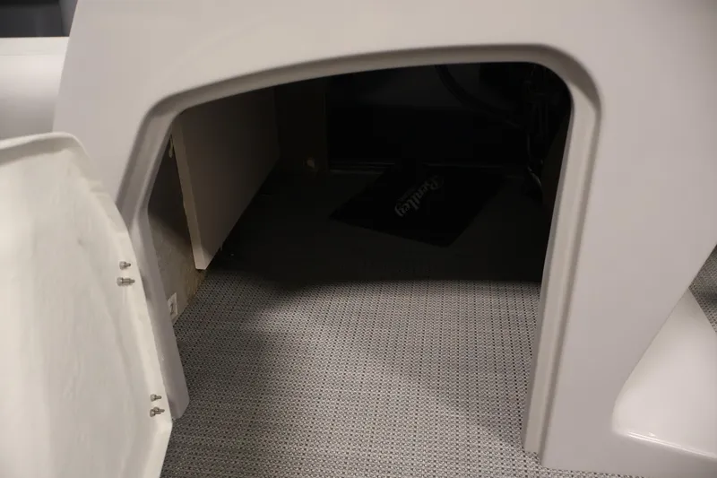 Slide: The Image of Interior storage compartment of 2026 Bentley Pontoons 240 Navigator boat. - 18