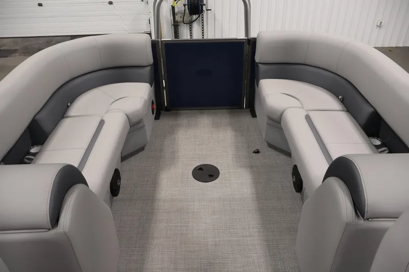 Slide: The Image of 2026 Bentley Pontoons 240 Navigator interior with gray seating and carpeted floor. - 27