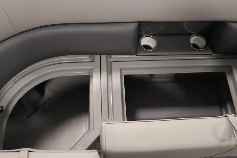 Slide: The Image of Interior seating and storage of 2026 Bentley Pontoons 240 Navigator with cup holders. - 30