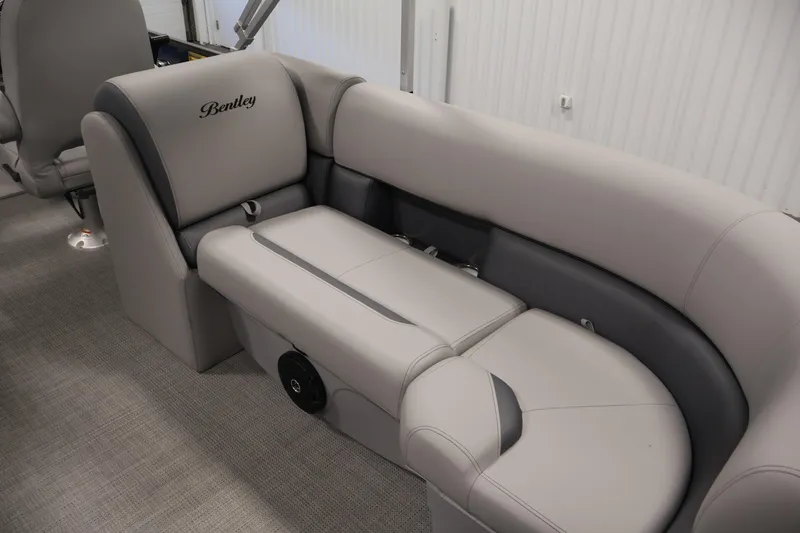 Slide: The Image of Luxurious seating in the 2026 Bentley Pontoons 240 Navigator, featuring elegant gray upholstery. - 31