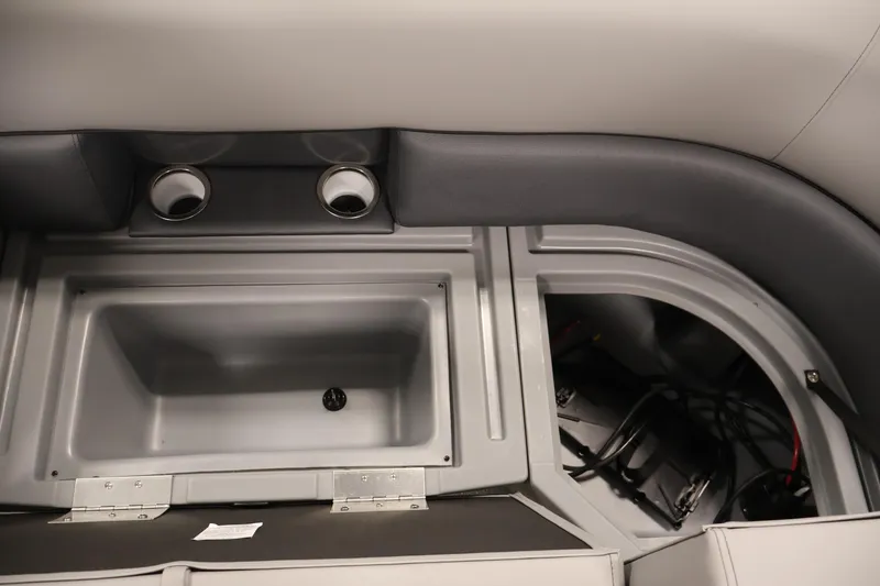 Slide: The Image of Interior of 2026 Bentley Pontoons 240 Navigator showing storage and cup holders. - 33