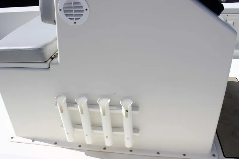 Slide: The Image of 2019 Bay Rider 2060 Skiff boat console with rod holders and seating. - 12
