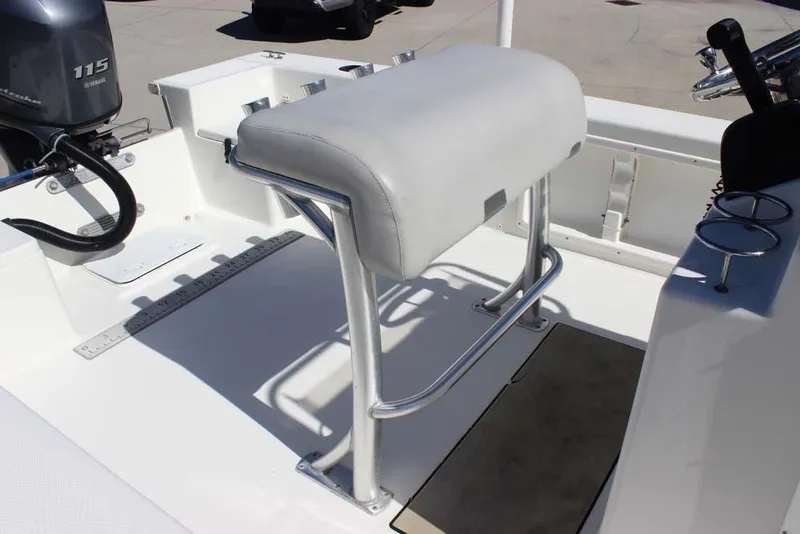 Slide: The Image of 2019 Bay Rider 2060 Skiff interior with Yamaha 115 engine and cushioned seating. - 13