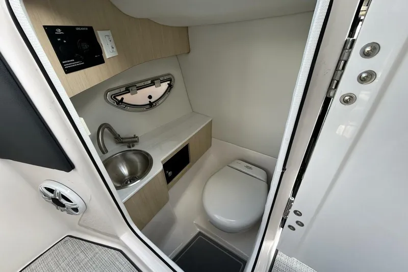 Slide: The Image of 2026 Regal 26 LX6 - Helm Access - 20