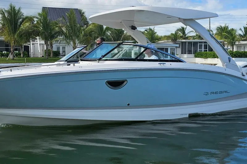 Slide: The Image of 2026 Regal 26 LX6 - Profile Port 3/4 Bow - 35