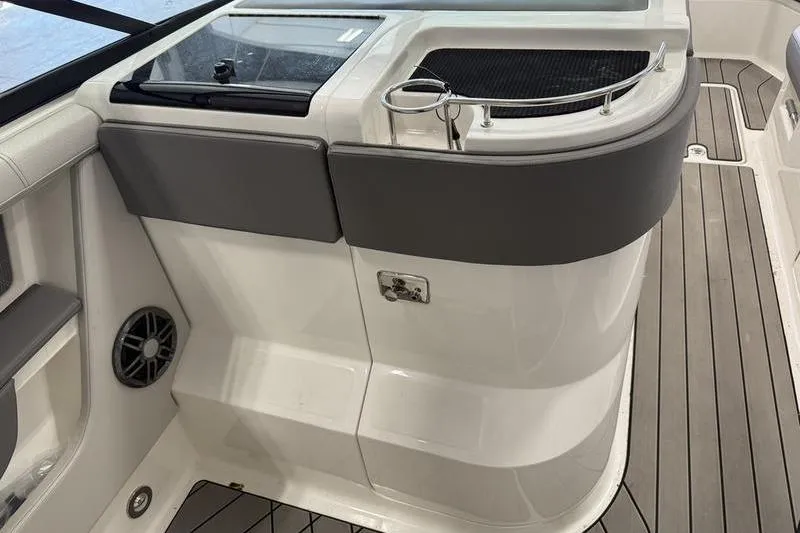 Slide: The Image of 2023 Sea Ray SLX 310 boat interior with sleek design and modern amenities. - 26