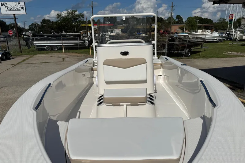 Slide: The Image of 2026 Robalo R160 Center Console boat with sleek design and spacious seating. - 5