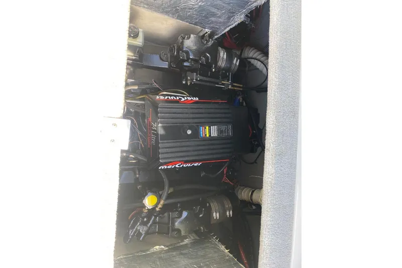 Slide: The Image of Engine compartment of a 1996 Crownline 266 BR boat with MerCruiser engine. - 9