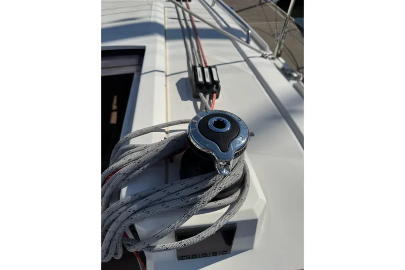 Slide: The Image of Winch and ropes on 2020 Beneteau Oceanis 30.1 sailboat deck. - 10