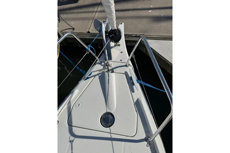 Slide: The Image of Bow of 2020 Beneteau Oceanis 30.1 sailboat docked at marina. - 14
