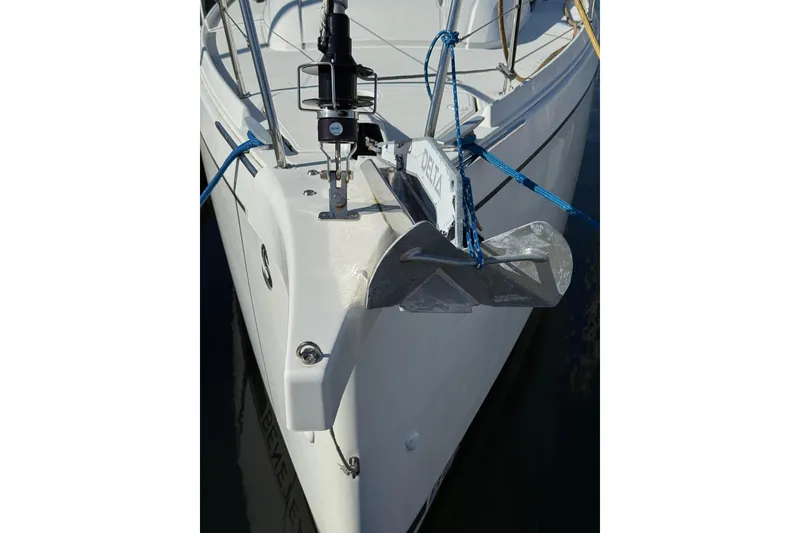 Slide: The Image of 2020 Beneteau Oceanis 30.1 sailboat bow with anchor and ropes. - 16