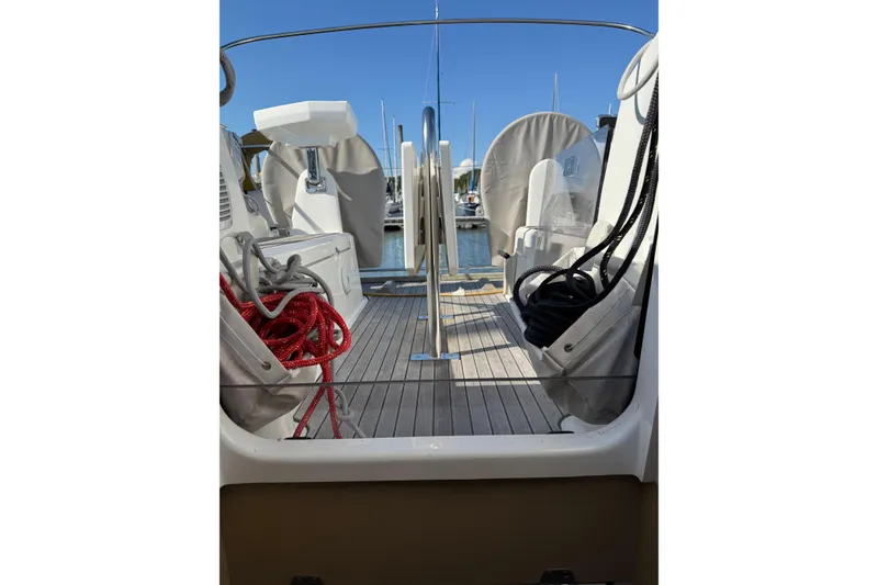 Slide: The Image of Beneteau Oceanis 30.1 sailboat deck with ropes and seating, 2020 model. - 18