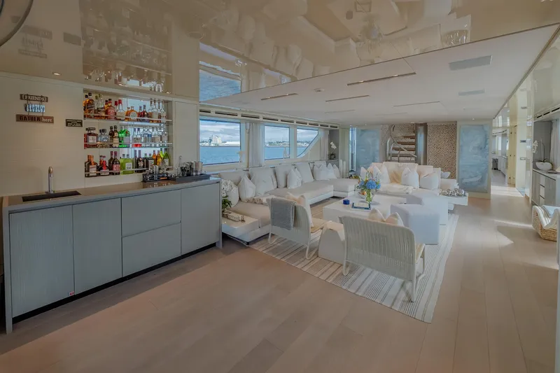 Slide: The Image of Luxurious interior of 2019 Sanlorenzo SD112 yacht with elegant seating and bar area. - 15