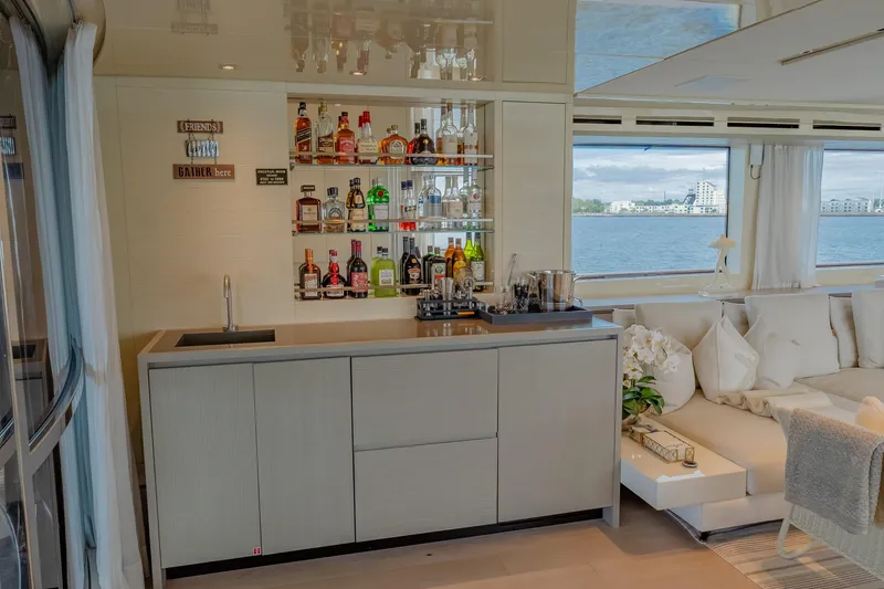 Slide: The Image of Luxurious Sanlorenzo SD112 yacht interior with elegant bar and comfortable seating, 2019 model. - 16