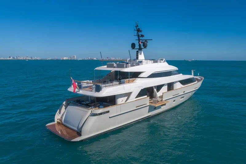 Slide: The Image of Luxurious 2019 Sanlorenzo SD112 yacht cruising on open sea under clear blue sky. - 2