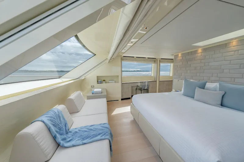 Slide: The Image of Luxurious Sanlorenzo SD112 yacht bedroom with ocean view, modern decor, and elegant furnishings. - 21