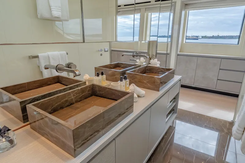 Slide: The Image of Luxurious bathroom on 2019 Sanlorenzo SD112 yacht with dual marble sinks and ocean view. - 23