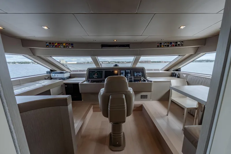 Slide: The Image of Luxurious 2019 Sanlorenzo SD112 yacht helm with panoramic windows and modern navigation equipment. - 40