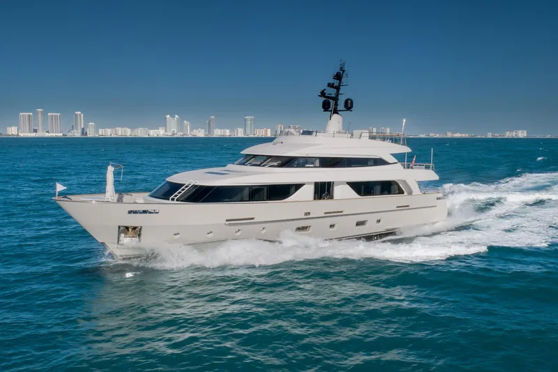 Slide: The Image of Luxurious 2019 Sanlorenzo SD112 yacht cruising on blue ocean near city skyline. - 5