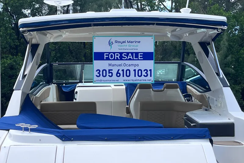 Slide: The Image of 2020 Sea Ray Sundancer 320 Outboard for sale, featuring spacious seating and modern design. - 17