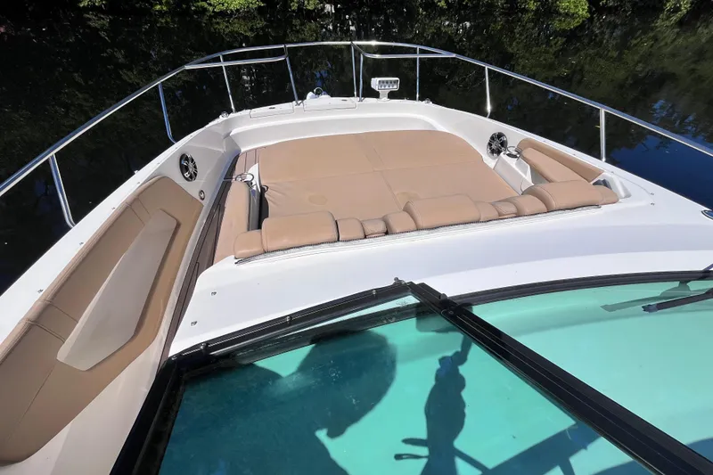 Slide: The Image of 2020 Sea Ray Sundancer 320 Outboard with spacious sunbathing area and sleek design. - 20