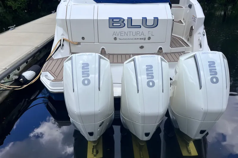 Slide: The Image of 2020 Sea Ray Sundancer 320 Outboard with triple Mercury 250 engines docked in Aventura, FL. - 6
