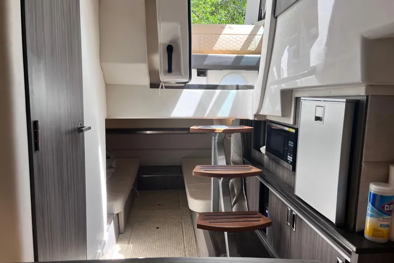 Slide: The Image of Interior of 2020 Sea Ray Sundancer 320 Outboard, featuring modern cabin amenities and sleek design. - 69