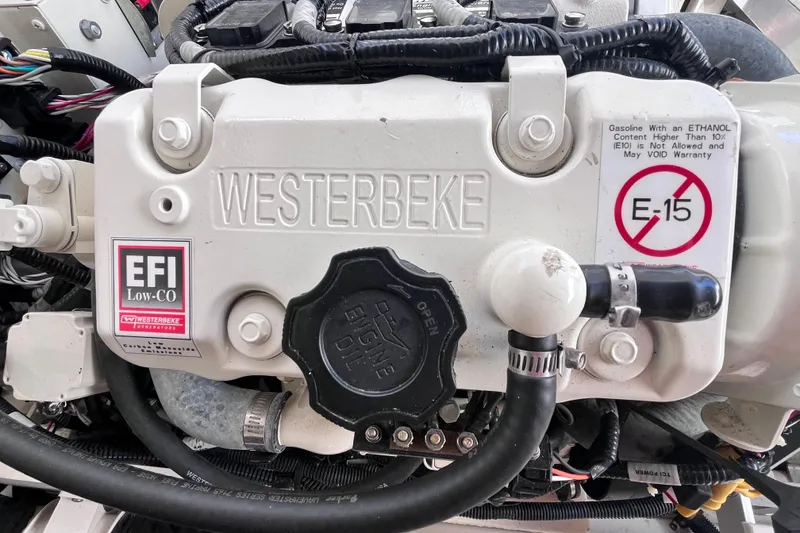 Slide: The Image of Westerbeke engine in 2020 Sea Ray Sundancer 320 Outboard, featuring EFI Low-CO technology. - 75