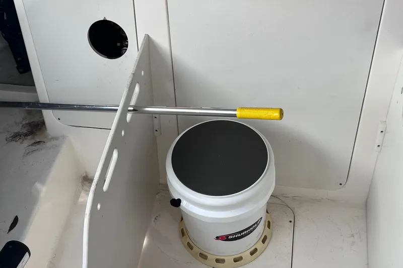 Slide: The Image of 2020 Sea Ray Sundancer 320 Outboard interior with storage compartment and equipment. - 76