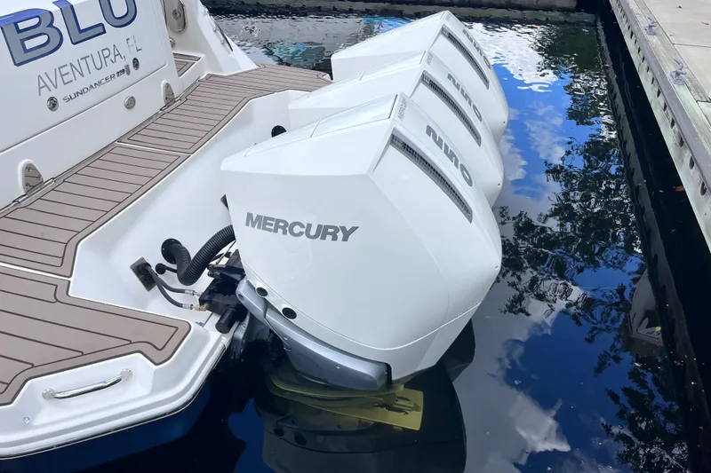 Slide: The Image of 2020 Sea Ray Sundancer 320 Outboard with triple Mercury engines docked in Aventura, FL. - 8