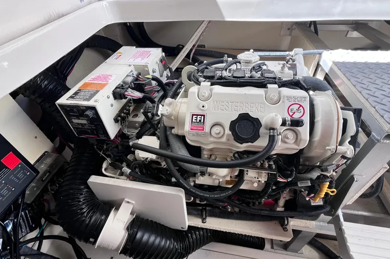 Slide: The Image of Engine compartment of 2020 Sea Ray Sundancer 320 Outboard with Westerbeke generator. - 85