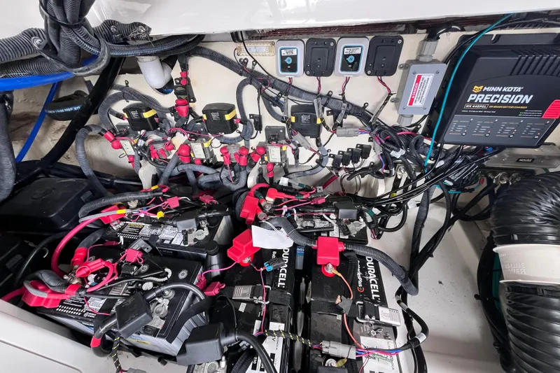 Slide: The Image of Electrical system of a 2020 Sea Ray Sundancer 320 Outboard with batteries and wiring. - 87