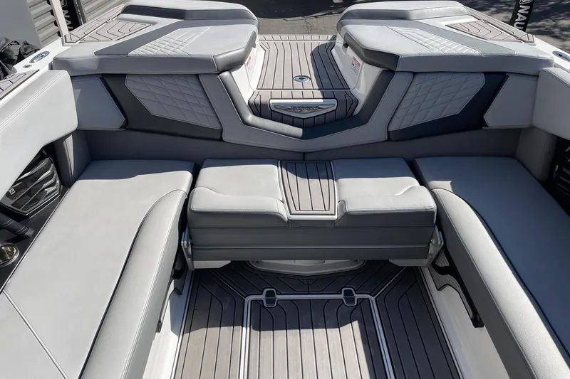 Slide: The Image of 2022 Nautique Super Air Nautique G25 interior with luxurious seating and modern design. - 8