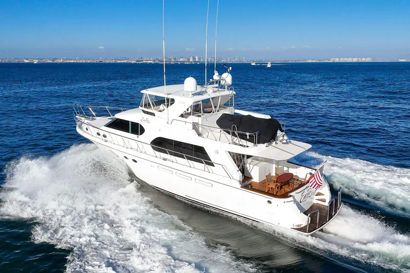 Slide: The Image of 2006 Ocean Alexander 64 Pilothouse yacht cruising on open water. - 17