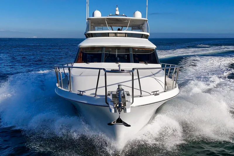 Slide: The Image of 2006 Ocean Alexander 64 Pilothouse yacht cruising on open sea. - 22