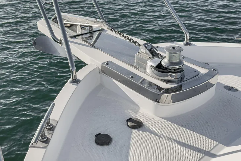 Slide: The Image of 2006 Ocean Alexander 64 Pilothouse yacht bow with anchor and winch system. - 24