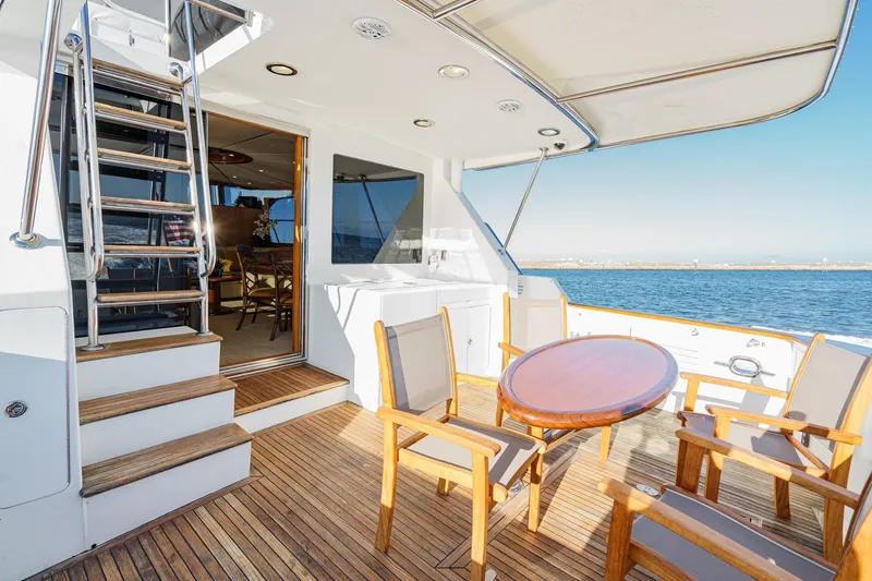 Slide: The Image of Luxury deck of 2006 Ocean Alexander 64 Pilothouse yacht with seating and ocean view. - 37