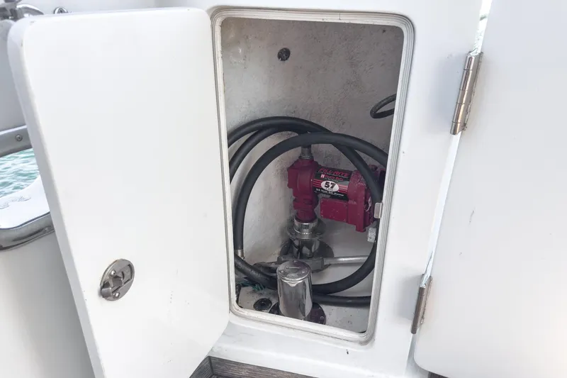 Slide: The Image of Open compartment on 2006 Ocean Alexander 64 Pilothouse yacht showing mechanical equipment. - 41
