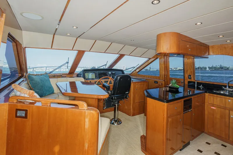 Slide: The Image of Luxurious 2006 Ocean Alexander 64 Pilothouse interior with elegant wood finishes and panoramic windows. - 46