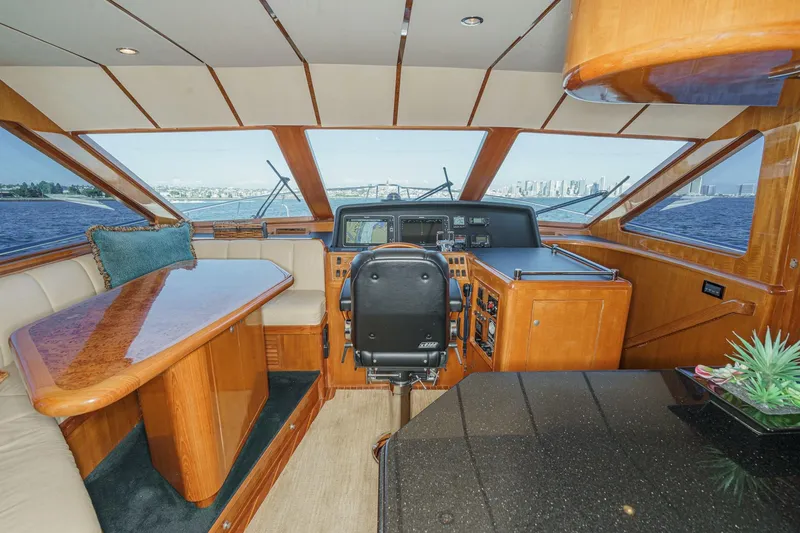 Slide: The Image of Luxurious 2006 Ocean Alexander 64 Pilothouse interior with helm, seating, and panoramic windows. - 47