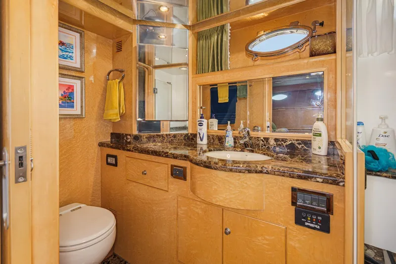 Slide: The Image of Luxurious bathroom in 2006 Ocean Alexander 64 Pilothouse yacht with marble countertop. - 59