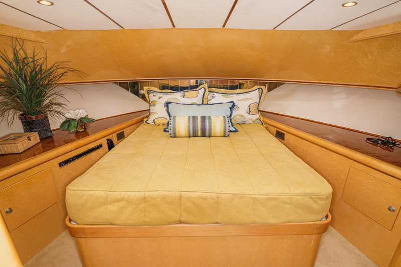 Slide: The Image of Luxurious bedroom interior of 2006 Ocean Alexander 64 Pilothouse yacht with elegant bedding. - 61