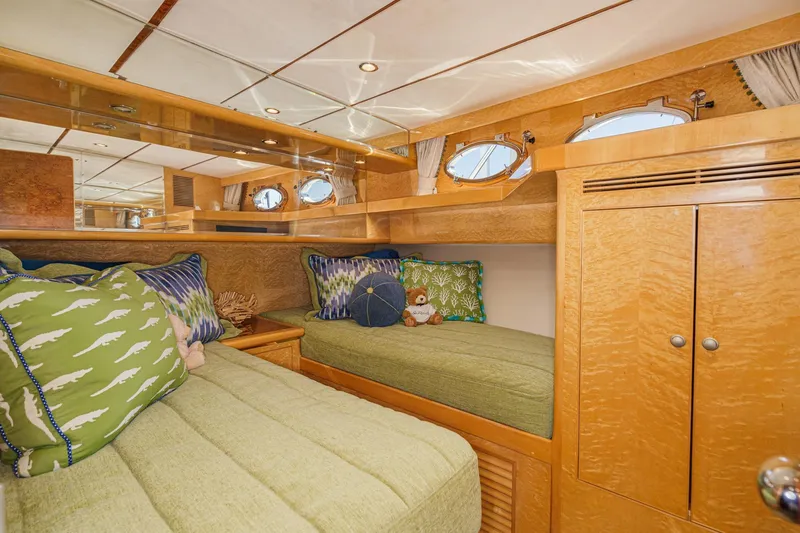 Slide: The Image of Luxurious 2006 Ocean Alexander 64 Pilothouse cabin with cozy twin beds and elegant wood finish. - 63
