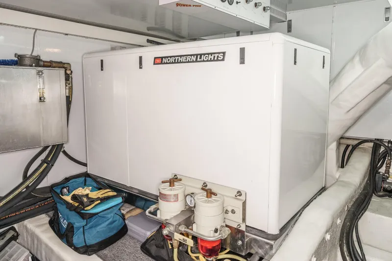 Slide: The Image of Engine room of 2006 Ocean Alexander 64 Pilothouse with Northern Lights generator. - 75